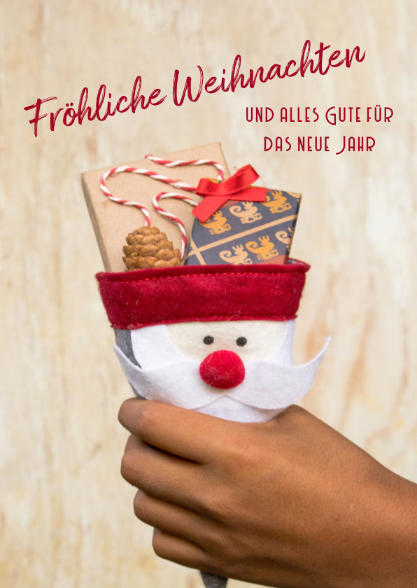 Weihnachtskarten - FairTrade-Weihnachtskarte mit Hand und Geschenken